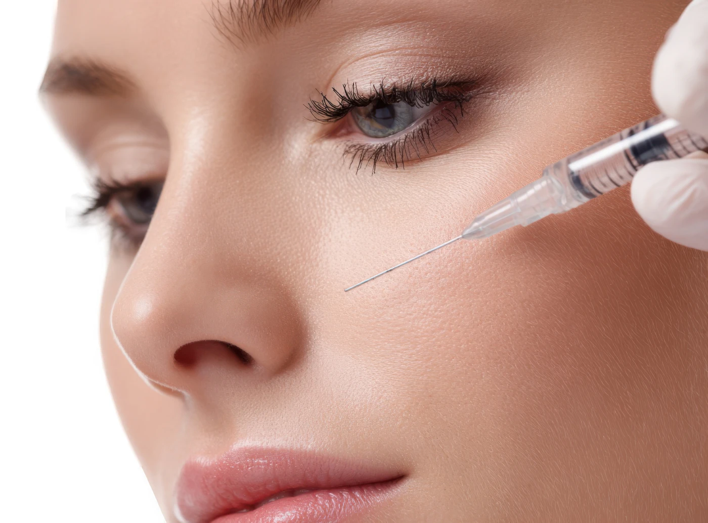 Woman Receiving Liquid Rhinoplasty injection at The Aesthetic Center
